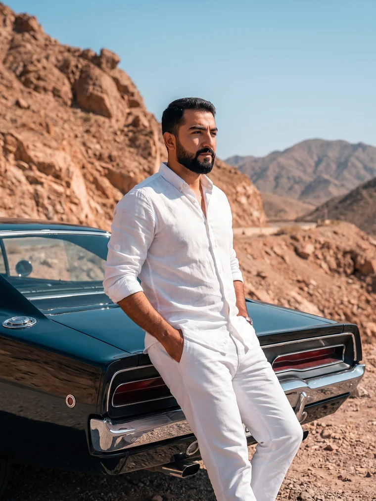 Desert road, leaning against the rear of the car